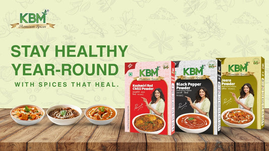 KBM masala spice packs with bowls of dishes and text Stay Healthy Year-Round – Spices That Heal.